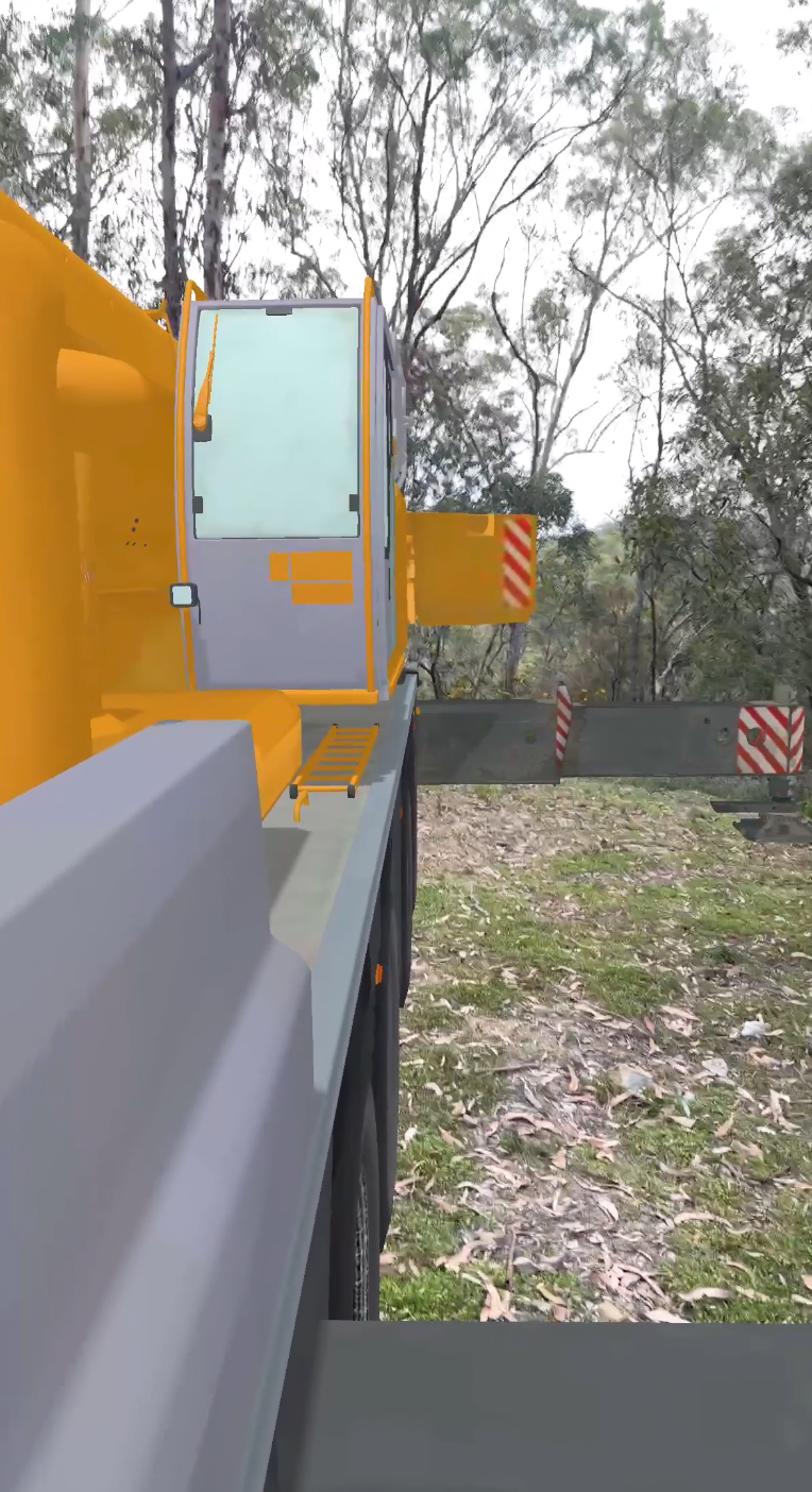 VisualQuip AR screenshot showing a crane cab, carrier deck and outrigger in a wooded site area